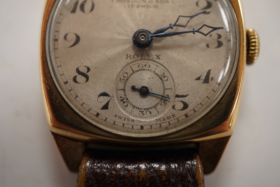 A gentleman's 1930's yellow metal Rolex manual wind wrist watch, retailed by Croydon & Sons, Ipswich, with Arabic dial and subsidiary seconds, the case back numbered 554 over 37665, case diameter 26mm, on a late associat